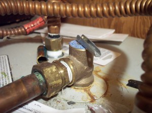 Water heater pressure and temperature relief valve.  